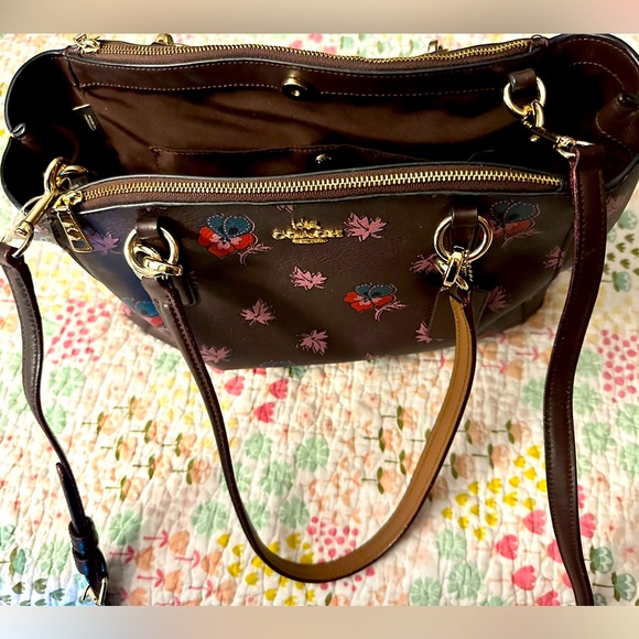 Coach Handbags - COACH| Bag with adjustable shoulder strap and hand strap.